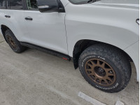 Fabryka4x4 Rock Sliders – Toyota Land Cruiser J150. Heavy-duty steel side steps provide strong sill protection and a functional step for off-road and everyday use. Credit: Photos by Christopher