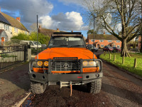 Installation of Fabryka4x4 Front Steel Winch Bumper with Bullbar on a Toyota Land Cruiser 80 Series. Heavy-duty steel construction with integrated winch and recovery points. Credit: Photos by Kieron