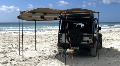 4x4 Awning Setup in Wind and Rain: Pegging and Drainage Checks