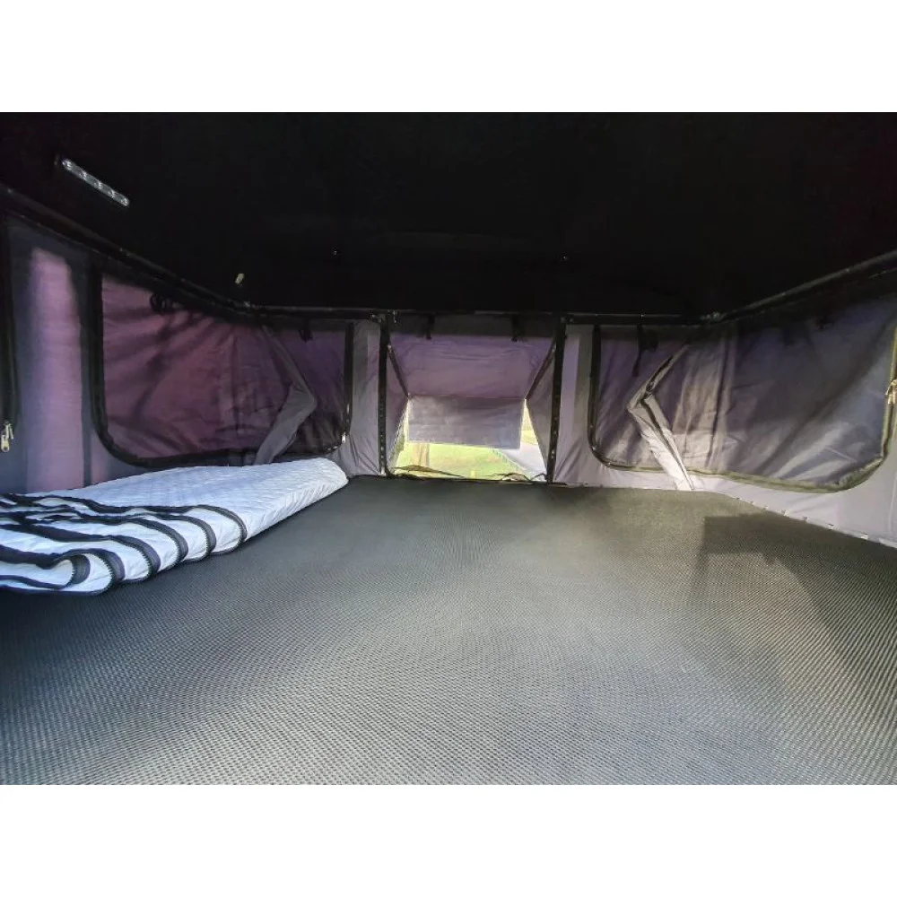 DT Adventure Extreme V2 rooftop tent mounted on 4x4 overland vehicle – fast setup hard shell tent